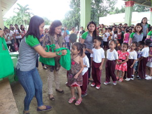 Children lining up to receive their Christmas package from Europhil.